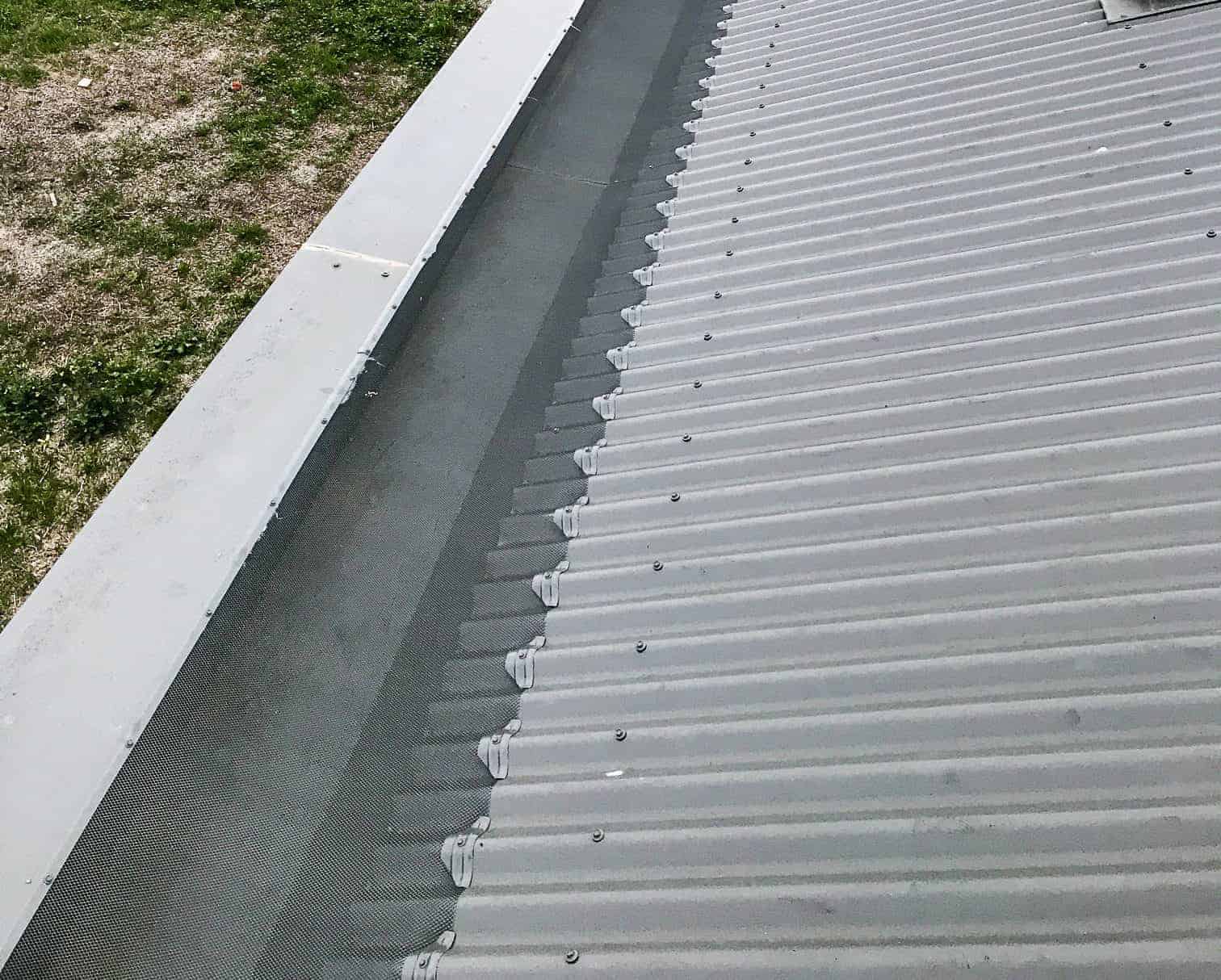 gutter guard on a corrugated box gutter roof