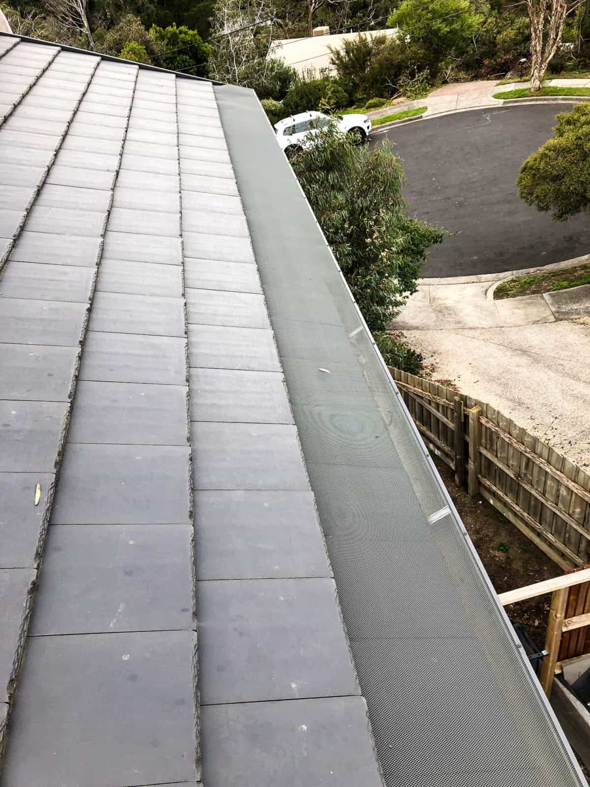 tile roof with gutter guard